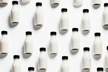 Milk bottle pattern on white background.