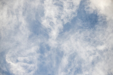 White clouds against a blue sky