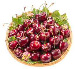 Sweet Red cherry in bamboo basket on white background, Red cherry with leaf isolate on white PNG File..