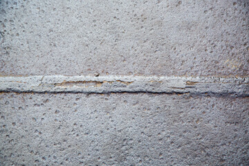 Weathered iron wall with seamless background of iron products