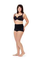 Fototapeta premium Portrait, smile and plus size woman in underwear in studio isolated on a white background mockup space. Happy person, model and body positivity, health and natural beauty of confident young girl