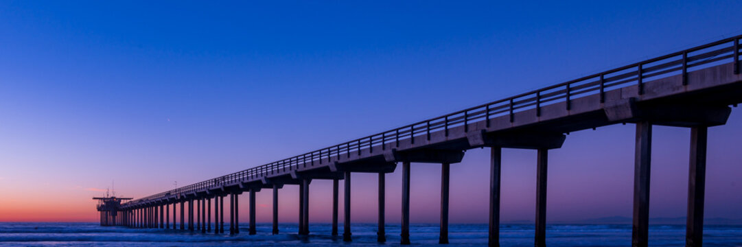 Panoramic view of UCSD Scripps Pier in La Jolla at Magic Hour
