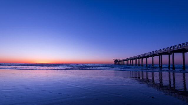 Panoramic view of UCSD Scripps Pier in La Jolla at Magic Hour
