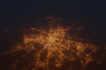 Aerial shot on Poznan (Poland) at night, view from west. Imitation of satellite view on modern city with street lights and glow effect. 3d render