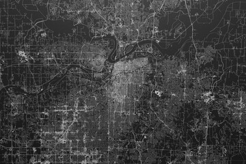 Street map of Kansas City (Missouri, USA) on black paper with light coming from top