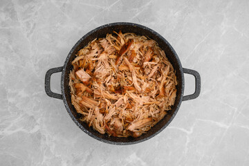 Top view of pulled pork in a pan