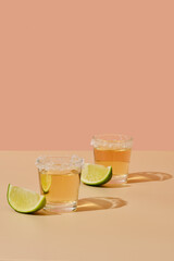 Two tequila shots with salt and lime