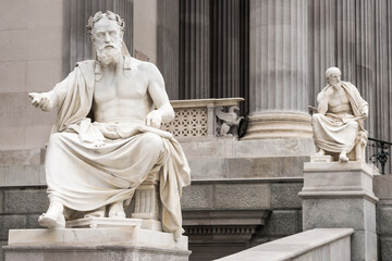 The statues of Xenophon and Herodotus adorn the Austrian parliament in Vienna, Austria