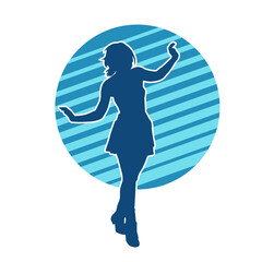 Silhouette of a female dancer wearing mini skirt in action pose. Silhouette of a slim woman dancing happily.