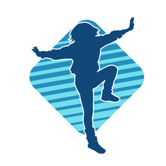 Silhouette of a slim female in dance pose. Silhouette of a woman dancing.