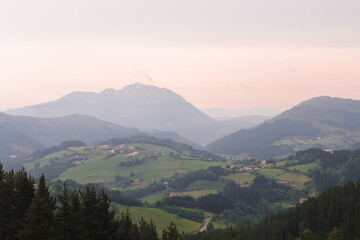 green mountains and village