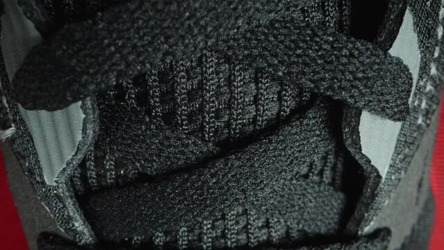 Top view of sports running shoes with mesh for ventilation. Dolly slider, close up.