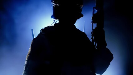 Silhouette military soldier in army camouflage, warrior with weapon assault rifle carbine. Special forces, commando, swat. Shadow mercenary in uniform and helmet. War concept. Private military company