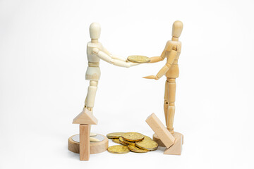 Wooden doll with wooden toy block isolated on white background. business or creative concept