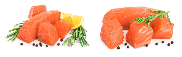 raw salmon piece cube with rosemary, lemon and peppercorn isolated on white background close up