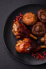 Delicious grilled chicken legs with spices and herbs in teriyaki sauce
