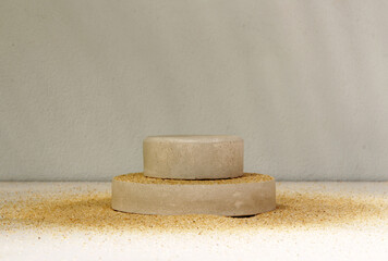 podiums on the sand for presentation show product cosmetic display , stage pedestal or platform background
