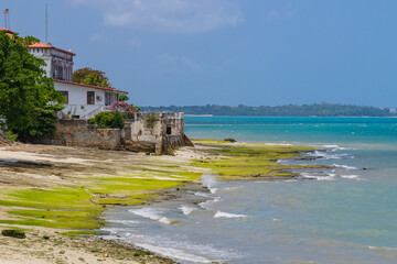 Fototapeta na wymiar Old colonial residential building at the seashore in a Stone town, Zanzibar