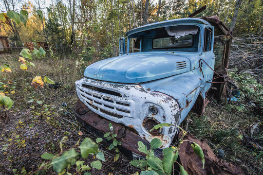 Chernobyl Zone, Ukraine - October 1, 2014: Old truck next to abandoned police station in Pripyat ghost city in Chernobyl Exclusion Zone