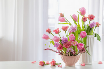 spring pink flowers  on background window
