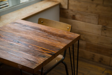 Coffee shop with wooden tables.