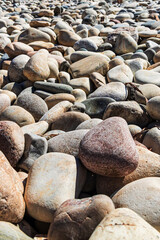 Abstract pebble texture. Background from stones in perspective. Soft focus