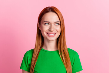 Photo of cunning tricky pretty woman with ginger hairdo dressed green t-shirt look at sale empty...