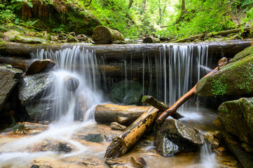 A small stream in the Heiligengeist Gorge near Leutschach in Austria. The water runs through a...