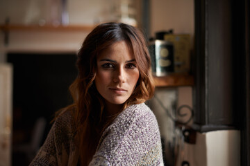 Portrait, beauty and a young woman in house alone to relax in kitchen of apartment. Pretty face,...