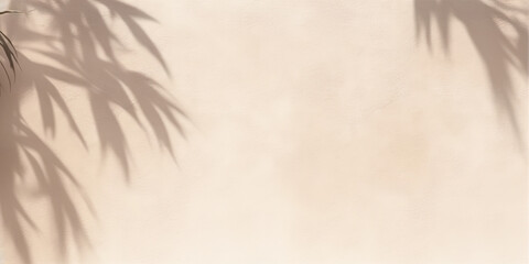 Beautiful texture of beige brown luxury, smooth stucco wall with soft foliage dappled light of tropical tree leaf shadow	
