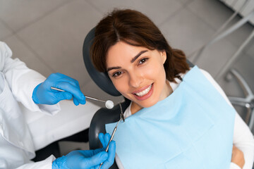  Dental check-up for a patient's teeth.