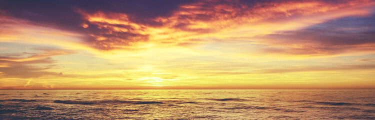 Seascape in the early morning. Sunrise over the sea. Nature landscape. Horizontal banner