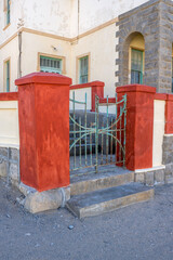 wrought iron gate of picturesque old building at historical town, Luderitz,  Namibia