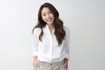 a lovely Asian girl with flawless skin and flowing long hair, set against a clean white background for a crisp and timeless aesthetic. Generative AI.