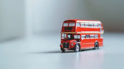 Foto op Plexiglas Miniature double-decker bus on a smooth surface © Artyom