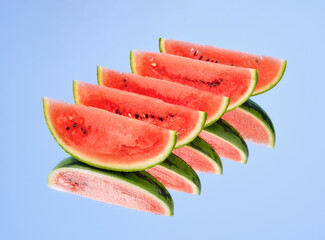 The watermelon slices on the mirror. Exotic summer party.