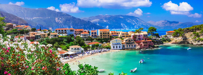 Greece  travel. One of the most beautiful traditional greek villages - scenic Assos in Kefalonia (Cephalonia) with colorful floral streets. Ionian islands , popular tourist destination .