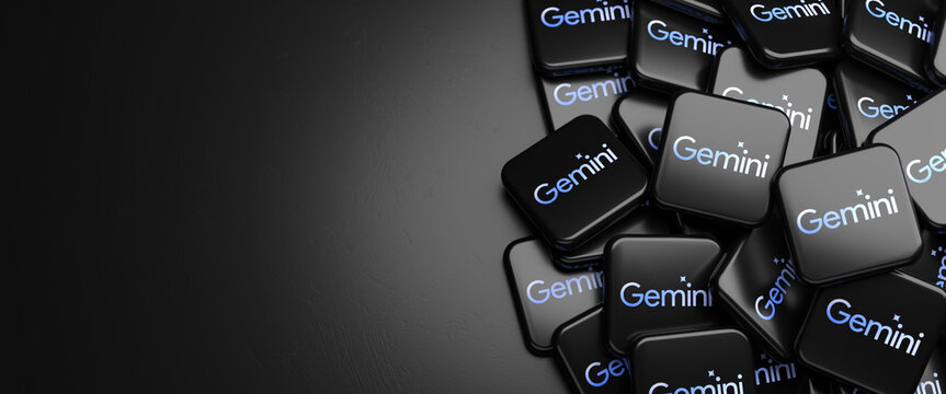 Logos of the Google AI product Gemini on a heap on a table. Copy space