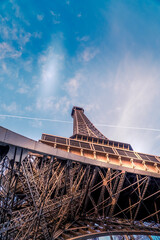 Eiffel's intricate web of steel structure.