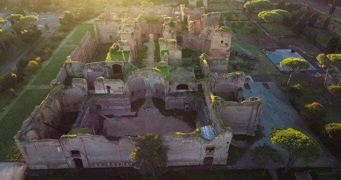 Chasing Shadows in Time: A Cinematic Aerial Exploration of Terme di Caracalla, Rome's Iconic Relics, as Day Transforms into Night. High quality 4k footage