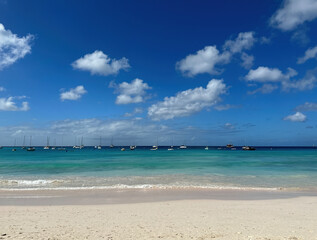 Fototapeta na wymiar beach on caribben sea with many small boats and sailing boats