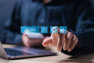 Document management concept, Person use laptop and hand touching virtual icon of  electronic documents for document management system and process automation. - obrazy, fototapety, plakaty