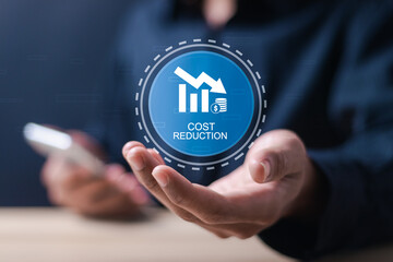 Cost reduction business finance concept. Businessman touching virtual cost icon to manage costs and budgets. Growth graph and profit optimize.