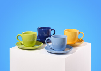 A set of colored drinking cups. Tea or coffee drinks.