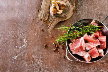 Raw organic meat ( beef or lamb ) in metal bowl