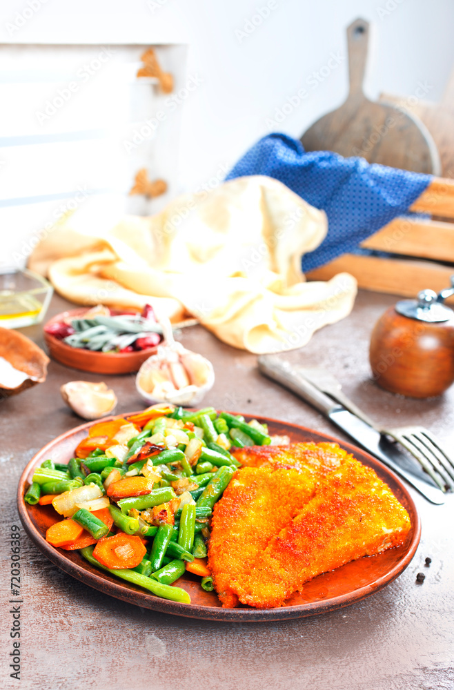 Sticker fish fillet with mixed vegetables on plate