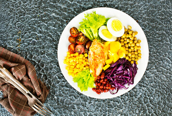 Salad, healthy food consist of lettuce, tomatoes, corn, carrot, boiled egg, smoked chicken - 720306750