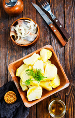 Salted Fish with Boiled Potato and Pickled Onions - 720307163