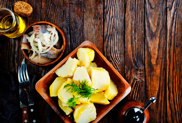Salted Fish with Boiled Potato and Pickled Onions - 720307178