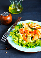 salad with fresh salmon, cucumber and olive oil